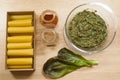Ingredients for cooking cannelloni with minced meat and spinach. The process of cooking dinner. Healthy food.