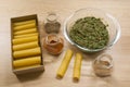 Ingredients for cooking cannelloni with minced meat and spinach. The process of cooking dinner. Healthy food.