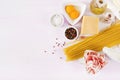 Ingredients for cooking Carbonara pasta, spaghetti with pancetta, egg, peppers Royalty Free Stock Photo