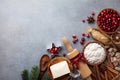 Ingredients for cooking Christmas baking. Flour, sugar, butter, cranberry and spices on table top view. Bakery background