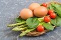 Ingredients for cooking frittata with asparagus, cherry tomatoes