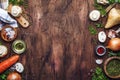 Ingredients for cooking green lentils with mushrooms and vegetables, spices and herbs, vintage wooden kitchen table background,