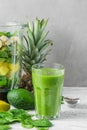 Ingredients for cooking healthy detox green smoothie in blender with glass of smoothie. Vegan cooking concept Royalty Free Stock Photo