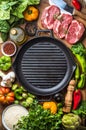 Ingredients for cooking healthy meat dinner. Raw uncooked beef steaks with vegetables, rice, herbs, spices and wine Royalty Free Stock Photo