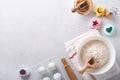 Ingredients for cooking homemade baking. Baking background with flour, eggs, kitchen tools, utensils and cookie molds on white mar Royalty Free Stock Photo