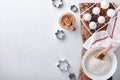 Ingredients for cooking homemade baking. Baking background with flour, eggs, kitchen tools, utensils and cookie molds on white mar Royalty Free Stock Photo