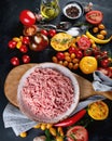 Ingredients for cooking - minced meat, tomatoes and spices