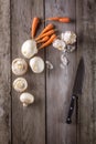 Ingredients for cooking: mushrooms, carrots and garlic