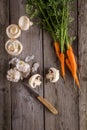 Ingredients for cooking: mushrooms, carrots and garlic