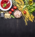 Ingredients for cooking pasta with shrimp, herbs, tomatoes, cheese, tomatoes in own juice border, place for text on wooden rustic