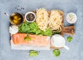 Ingredients for cooking pasta tagliatelle with salmon, spinach and cream Royalty Free Stock Photo