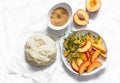 Ingredients for cooking peach mini pies - dough, fresh peaches, thyme, cane sugar on a light background, top view