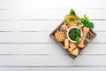 Ingredients for cooking Pesto sauce in a wooden Royalty Free Stock Photo