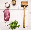 Ingredients for cooking pork steak with herbs and spices lined frame place for text wooden rustic background top view