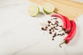 Ingredients for cooking spaghetti on a white marble background/Ingredients for cooking spaghetti on a white marble background. Co