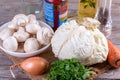 Ingredients for cooking stewed cabbage with mushrooms Royalty Free Stock Photo