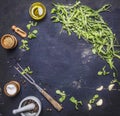 Ingredients for cooking vegetarian food, arugula Oil with salt and pepper place for text,frame wooden rustic background top vie Royalty Free Stock Photo
