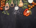 Ingredients for cooking vegetarian food wooden spoons, cherry tomatoes, dill, parsley, pepper border ,place text on wooden ru