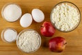 Ingredients for cottage cheese casserole with apples on table. Top view Royalty Free Stock Photo