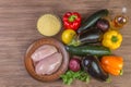 Ingredients dietary tabbouleh salad with roasted vegetables, chicken and couscous. The view from the top. Copy space.