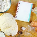 Ingredients for dough, cooking bread, pizza or pie, pasta, including flour, eggs, milk, on wooden rustic background, empty space f Royalty Free Stock Photo