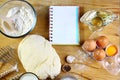 Ingredients for dough, cooking bread, pizza or pie, pasta, including flour, eggs, milk, on wooden rustic background, empty space f Royalty Free Stock Photo