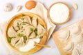 Ingredients dumplings on a white table