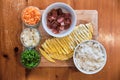 Ingredients for Fried Rice - Pork Sausages, Carrots, Beans, Rice and Omelette. Royalty Free Stock Photo