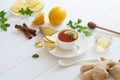 Ingredients for ginger tea with lemon, honey, mint, cinnamon on white table Royalty Free Stock Photo