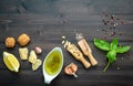 The ingredients for green pesto sauce on dark wooden background Royalty Free Stock Photo