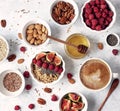 Ingredients for a healthy breakfast, oatmeal with raspberries, figs, pecans, almonds, flax seeds, chia seeds with honey Royalty Free Stock Photo