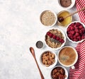Ingredients for a healthy breakfast, oatmeal with raspberries, figs, pecans, almonds, flax seeds, chia seeds with honey and coffee Royalty Free Stock Photo