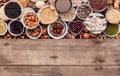 Ingredients for the healthy foods selection in ceramic bowl. The concept of superfoods set up on white shabby wooden background Royalty Free Stock Photo