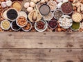 Ingredients for the healthy foods selection in ceramic bowl. The concept of superfoods set up on white shabby wooden background Royalty Free Stock Photo