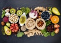 Ingredients for the healthy foods selection. The concept of healthy food set up on dark stone background Royalty Free Stock Photo