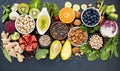 Ingredients for the healthy foods selection. The concept of healthy food set up on dark stone background Royalty Free Stock Photo