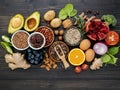 Ingredients for the healthy foods selection on dark background. Balanced healthy ingredients of unsaturated fats and fiber for the Royalty Free Stock Photo
