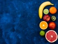Ingredients for the healthy foods selection.Mix of different fruits grapefruit, kiwi, tangerine, apple, lime, sicilian orange, Royalty Free Stock Photo