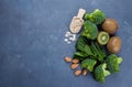 Ingredients for Healthy Green Smoothie. Broccoli, avocado, spinach, kiwi, oats and almond Royalty Free Stock Photo