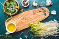 Ingredients for healthy salad - lettuce, sprouts, edibles flowers and arugula. Flat lay, copy space food. Detox. Organic Royalty Free Stock Photo