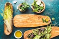 Ingredients for healthy salad - lettuce, sprouts, edibles flowers and arugula. Flat lay, copy space food. Detox. Organic Royalty Free Stock Photo