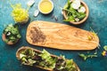 Ingredients for healthy salad - lettuce, sprouts, edibles flowers and arugula. Flat lay, copy space food. Detox. Organic Royalty Free Stock Photo