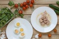 Ingredients for healthy salad: tuna fish, boiled eggs