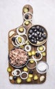 Ingredients for homemade burger, tuna, bun, sauce, olives, spices, laid out on a cutting board wooden rustic background top vie Royalty Free Stock Photo