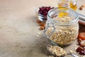 Ingredients for homemade oatmeal granola. Oat flakes, honey, almond nuts, dried cranberries and apricots. Healthy breakfast concep Royalty Free Stock Photo