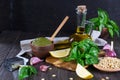 Ingredients for homemade pesto: basil, parmesan, pine nuts, garlic, olive oil Royalty Free Stock Photo