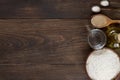 Ingredients for homemade pizza dough on wooden background. Royalty Free Stock Photo