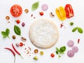 The ingredients for homemade pizza on white wooden background Royalty Free Stock Photo