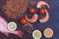 Ingredients for Indian cuisine are on a black wooden surface. Royalty Free Stock Photo