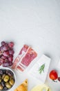 Ingredients for Italian  food, meat cheede, herbs, on white background, flat lay  with copy space for text Royalty Free Stock Photo